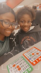 Andraya Brabham enjoy playing Bingo with a Literacy event